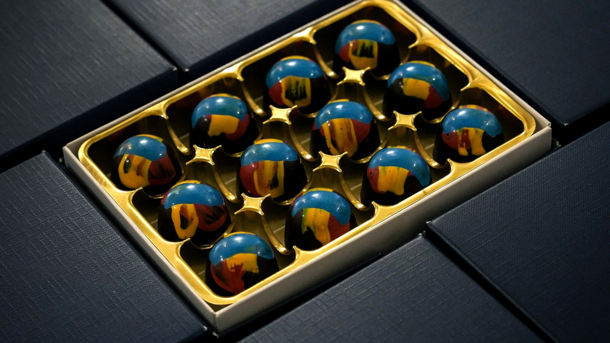 12 PBJ pecan praline and strawberry jelly vegan bonbons by XO Chocolate London