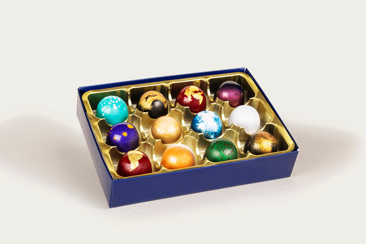 Deluxe 12-piece assortment of vibrant, luxury chocolates by XO Chocolate