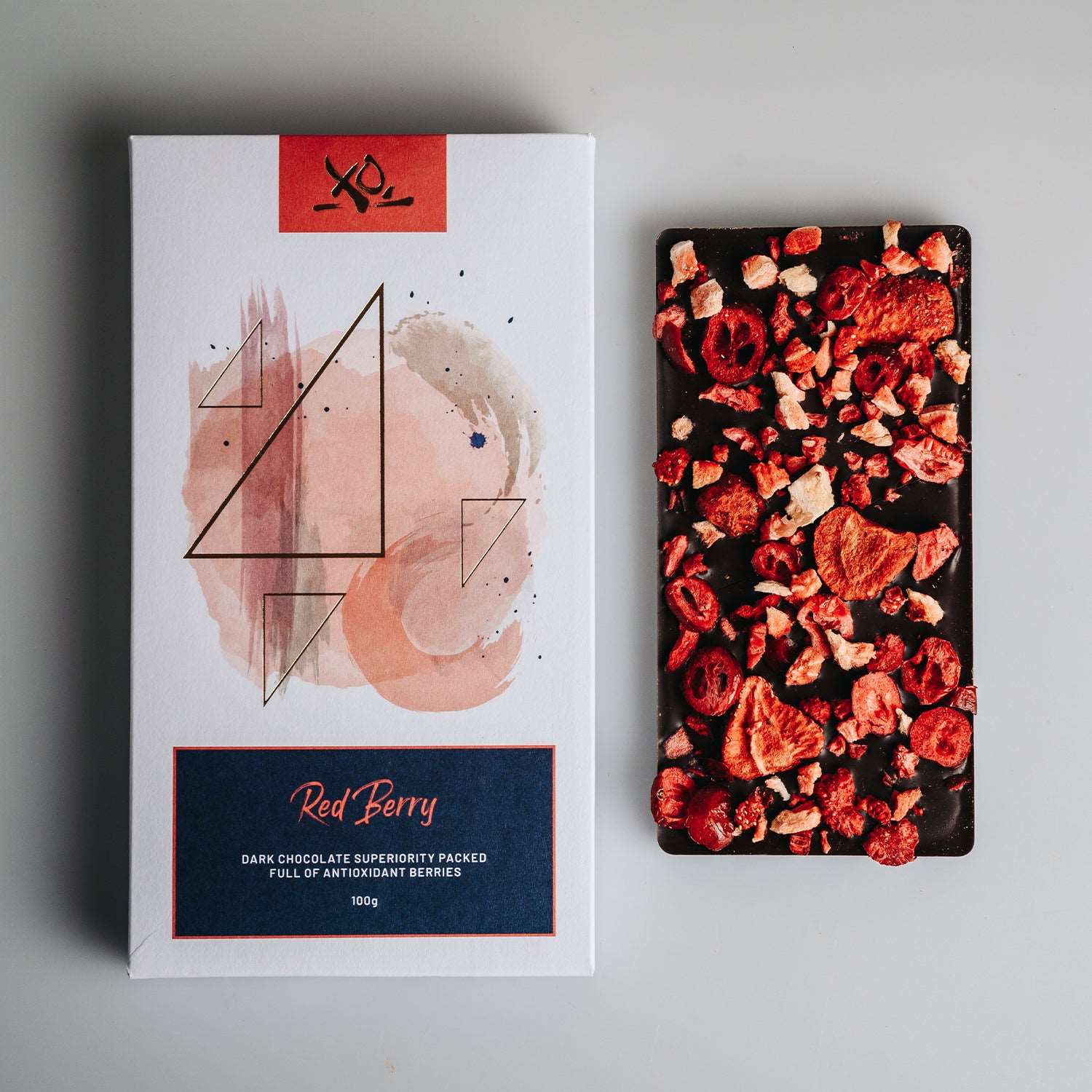 Red Berry Chocolate Bar by XOChocolate, infused with strawberries, raspberries, and cranberries.